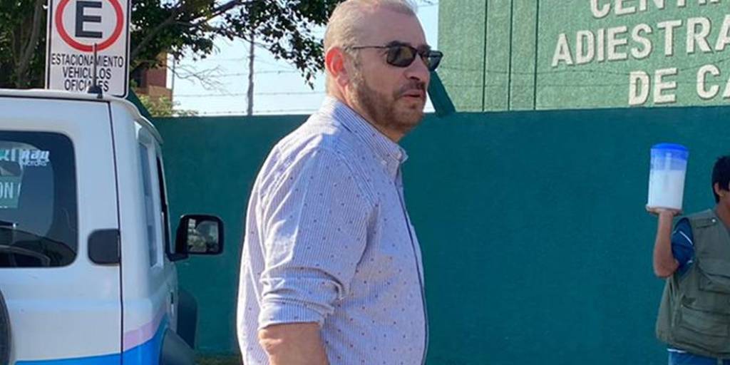 Rómulo Calvo antes de ingresar a oficinas de la Delcc