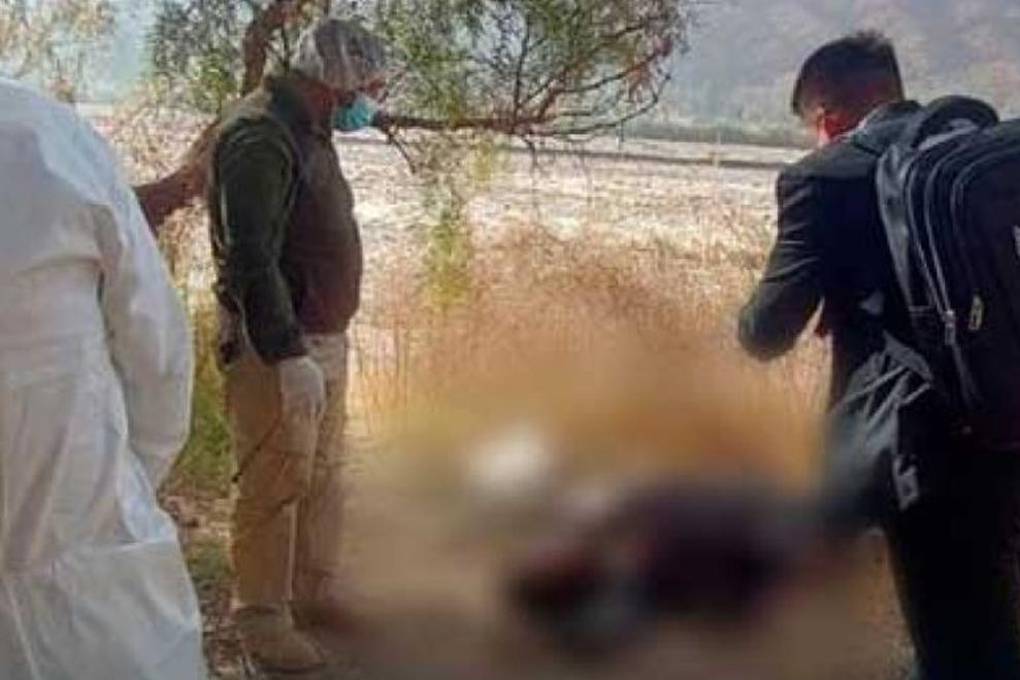 Levantamiento del cuerpo sin vida en el río Tupiza